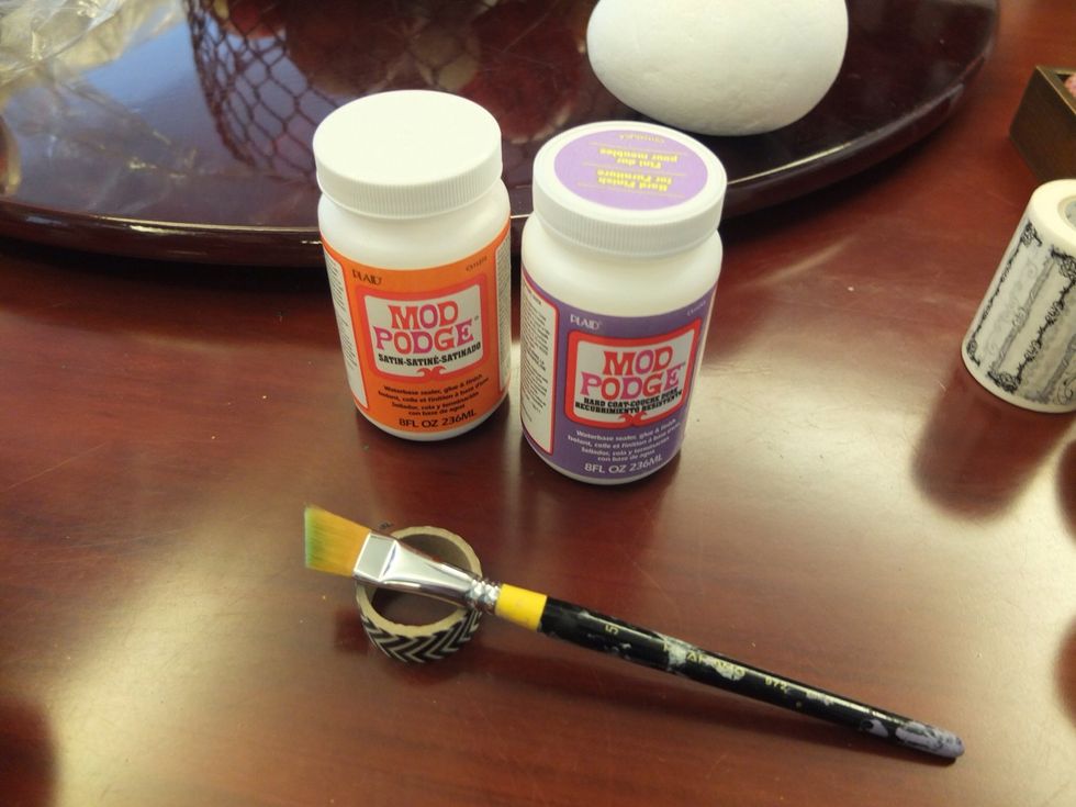 Get your Mod Podge, paint brush and an extra roll of tape ready for the next step.