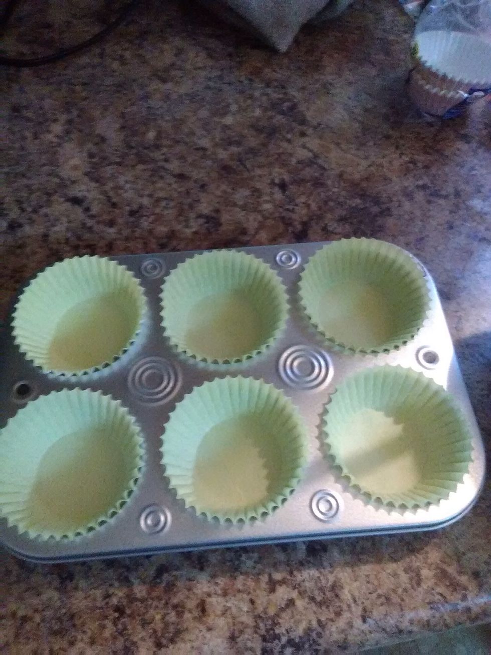 Get your muffin pan and place your paper cups