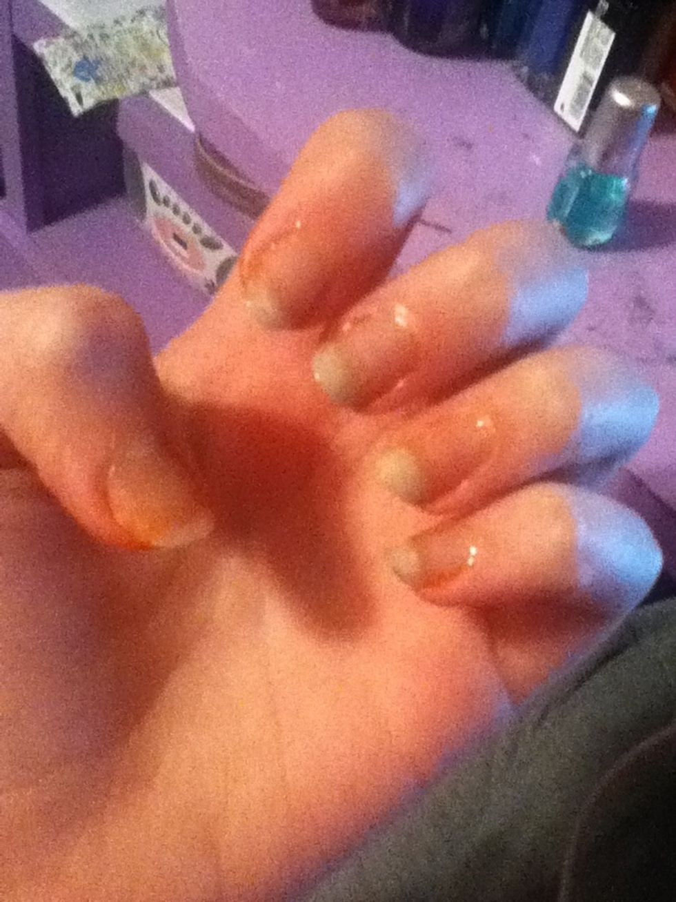 Get your nail polishes and a base\top coat. Apply the base coat and let it dry. I'm using wet n wild crystallize.