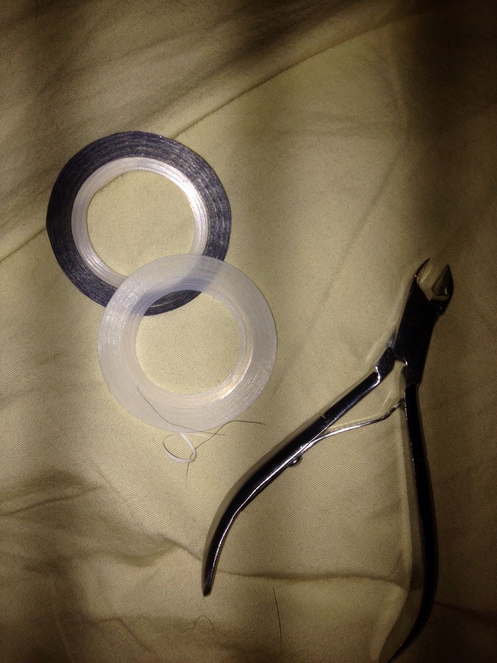 Get your nail tape and cuticle cutter