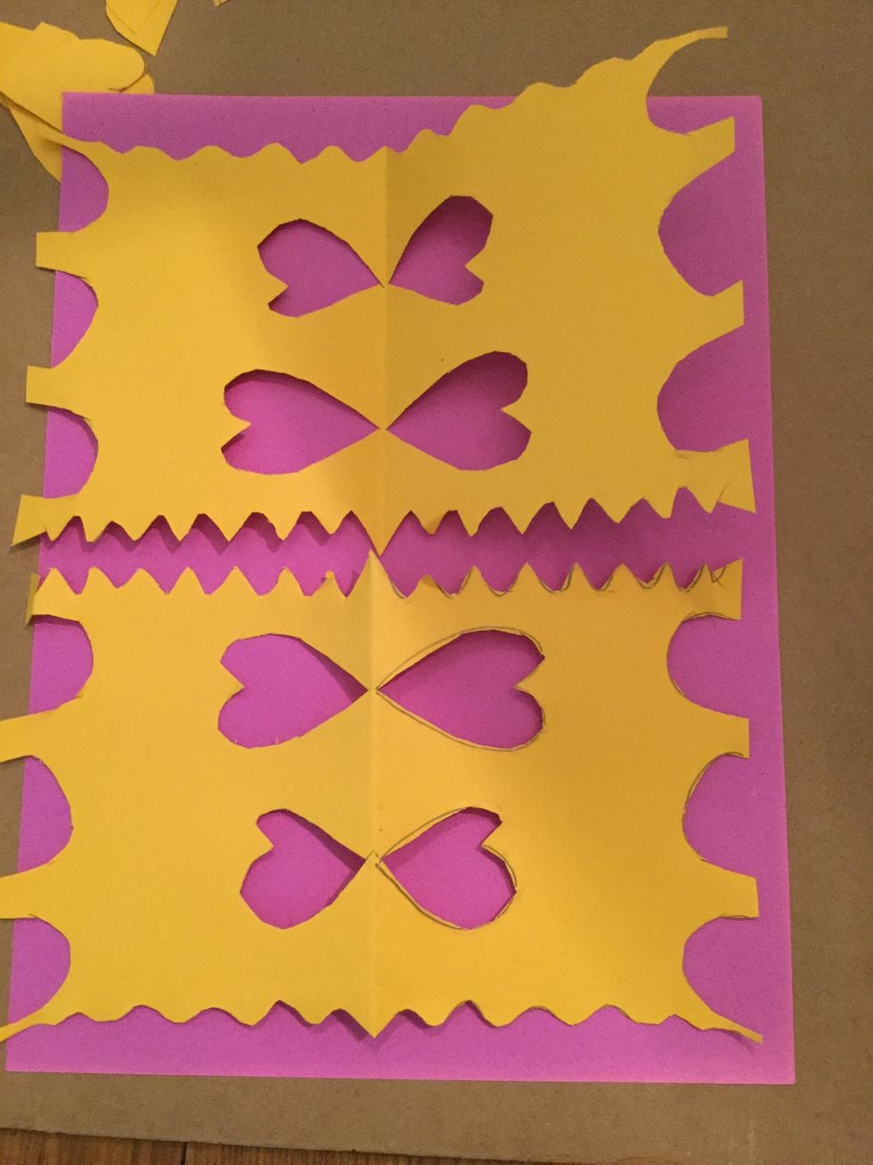 Get your other paper and line up your design to the edges.