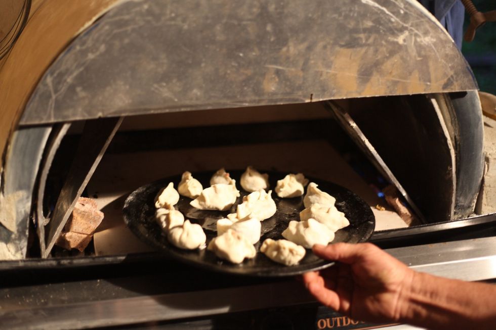 Get your oven ready to about 180 degrees. In this case my father built his own gas BBQ / wood fired oven... Go figure!!! So we thought we'd give it a try.