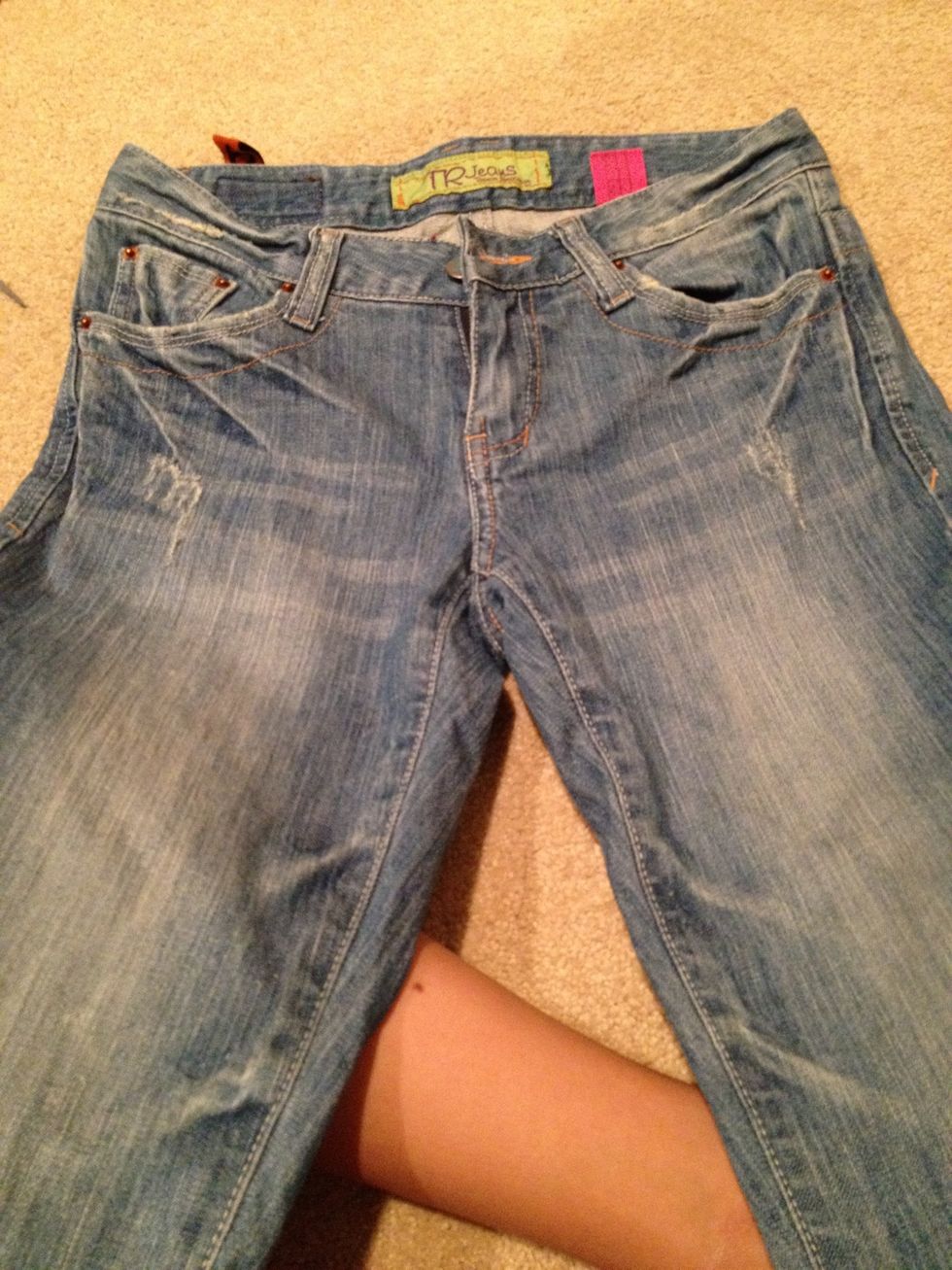 Get your pants and smooth them out just so they're flat.