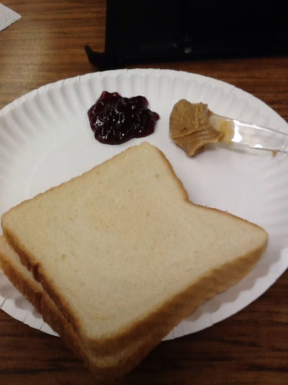 Get your peanut butter and jelly and your two slices of sandwich bread.