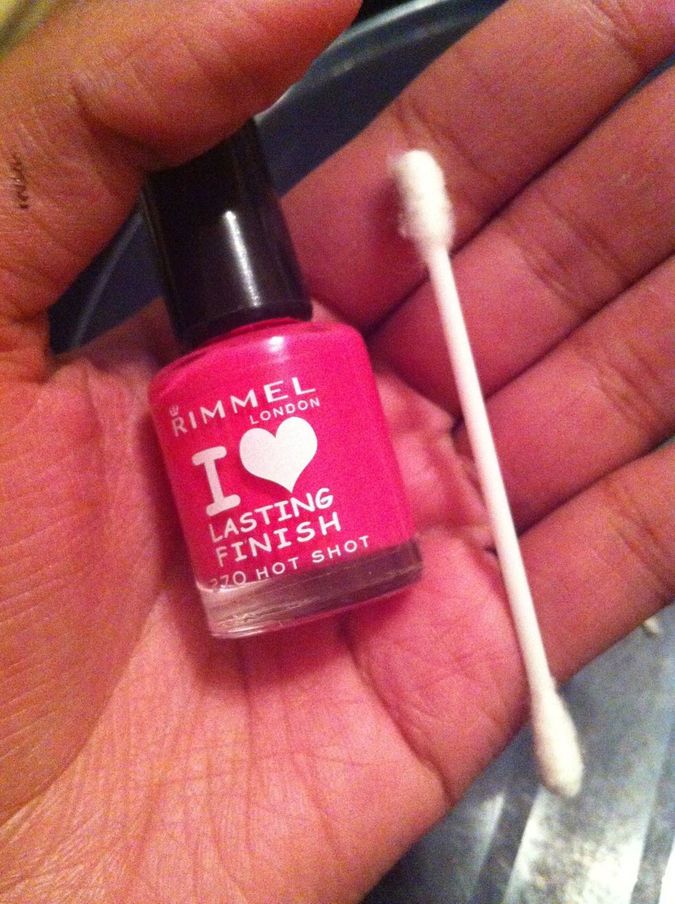 Get your pink nail varnish and a cotton bud