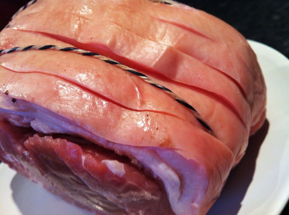 Get your Pork Shoulder, if the top hasn't been scored for you already gently cut lines into the fat for the Salt to sink into, this is what makes it so crispy..