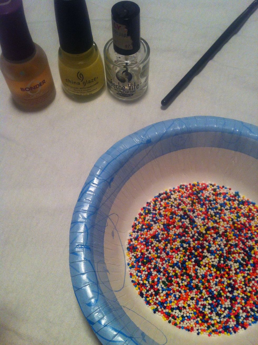 Get your supplies ready to use. Put sprinkles in a big enough bowl to dip your fingernail into without hitting the bottom-- set aside and try not to eat'em.