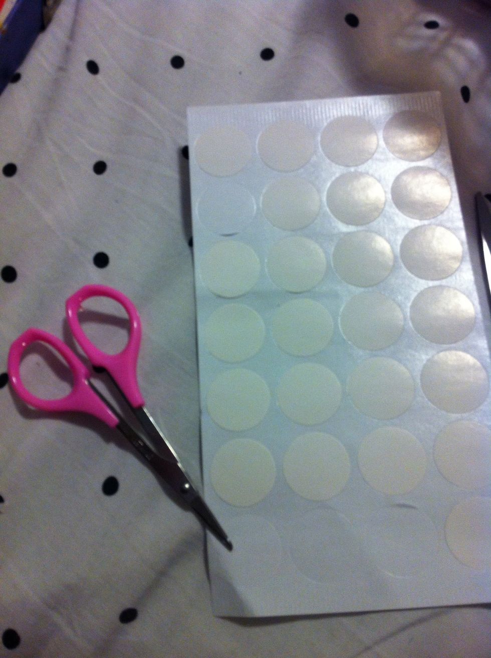 Get your tape or these circle things and cut out any design you want