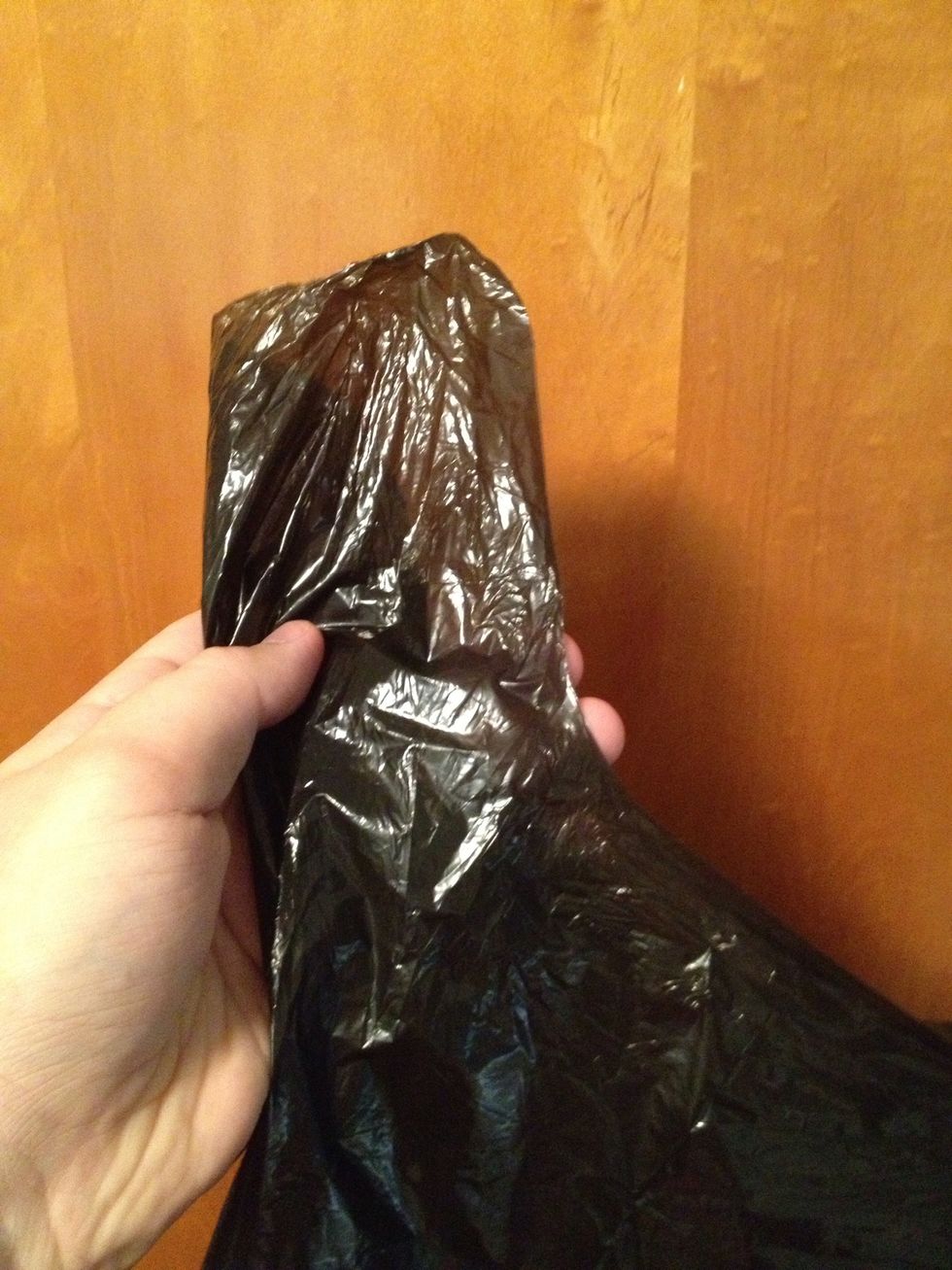 Get your tie flap trash bag ready. It should have four flap parts.