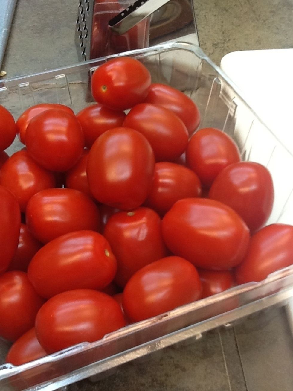 Get your tomatoes, they can be any kind. I prefer grape tomatoes because they're so sweet and can be used as snacks. Yum:)