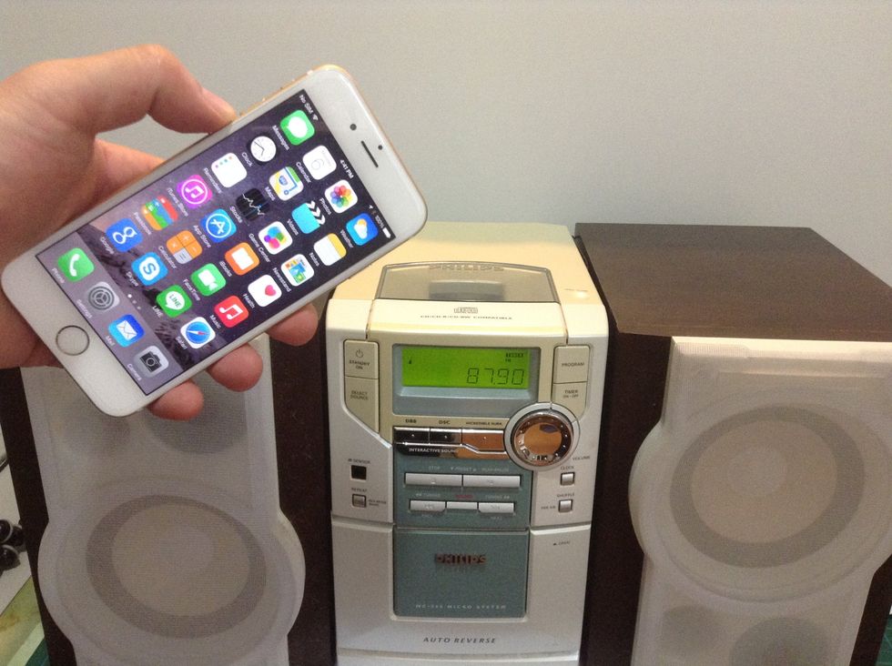 Getting your new iPhone 6 to home stereo without Bluetooth involves using a AUX output and lots of RCA wires.