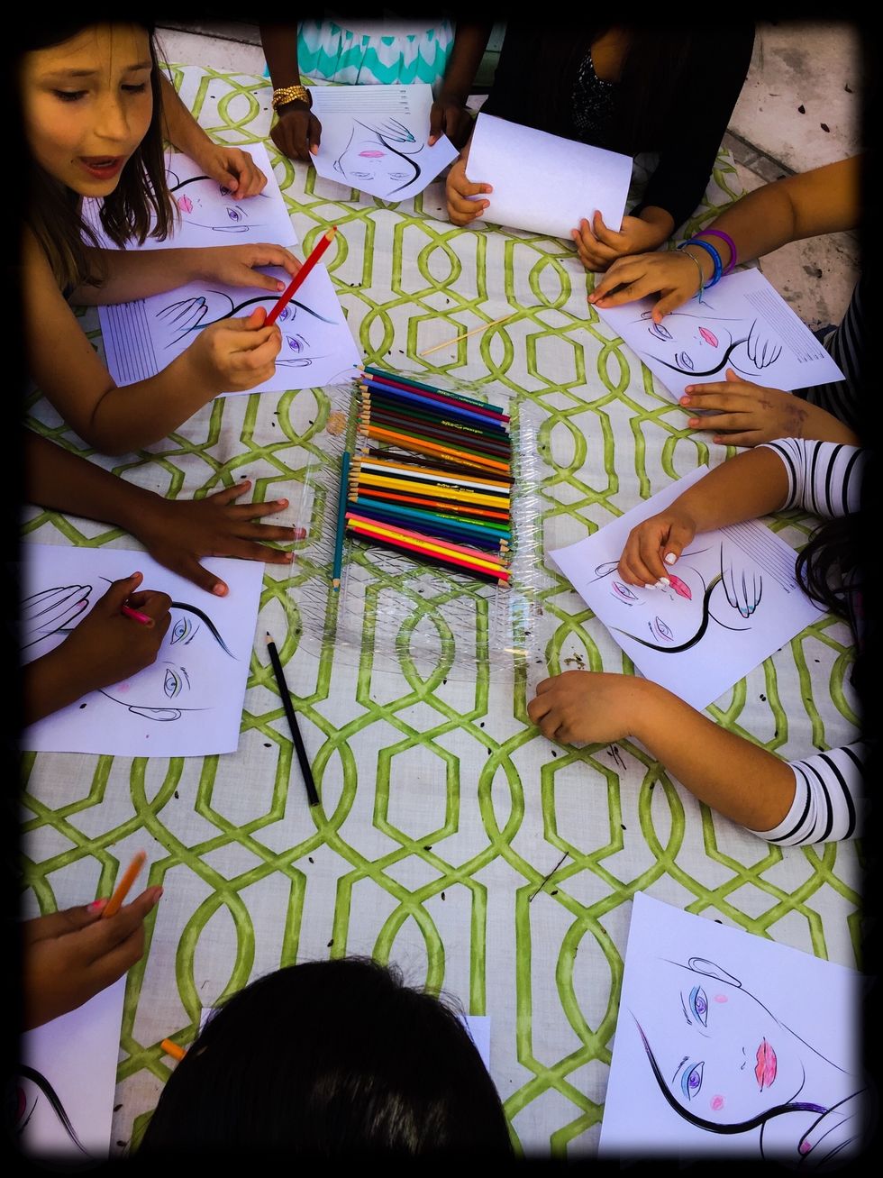 Girls first activity was "create your own makeup look". I printed coloring pages with woman face that I found online and girls loved to come up with different makeup ideas.