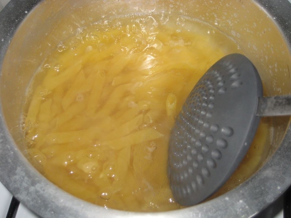 Give a stir and boil while uncovered.