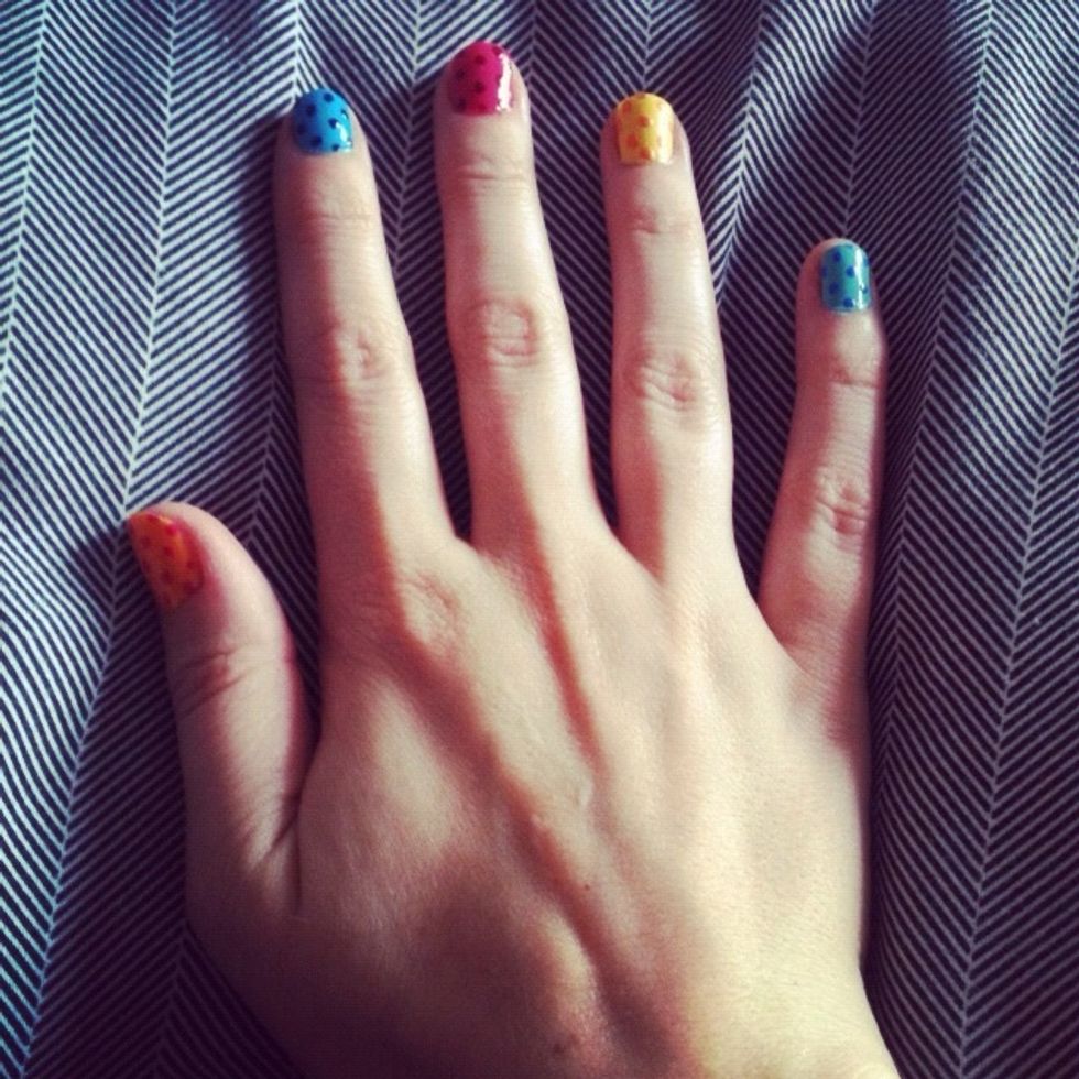 Give each nail a coat of clear varnish or top coat