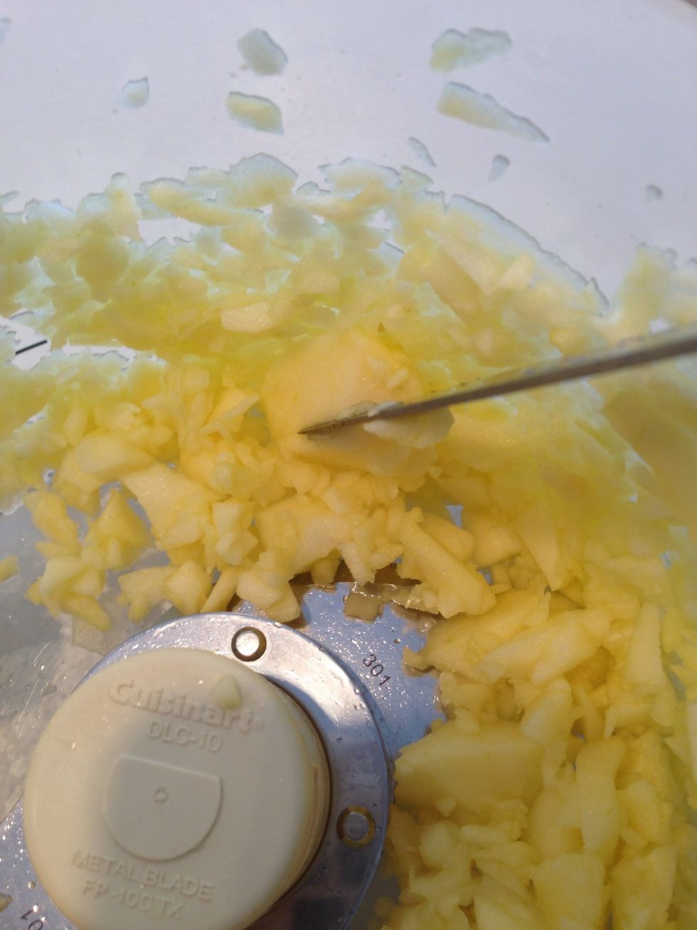 Give it a couple of pulses, then check. If it's mostly chopped, with only a few big chunks, stick a knife in there and fix it. Not looking to pur\u00e9e here. Scrape it into a bowl.