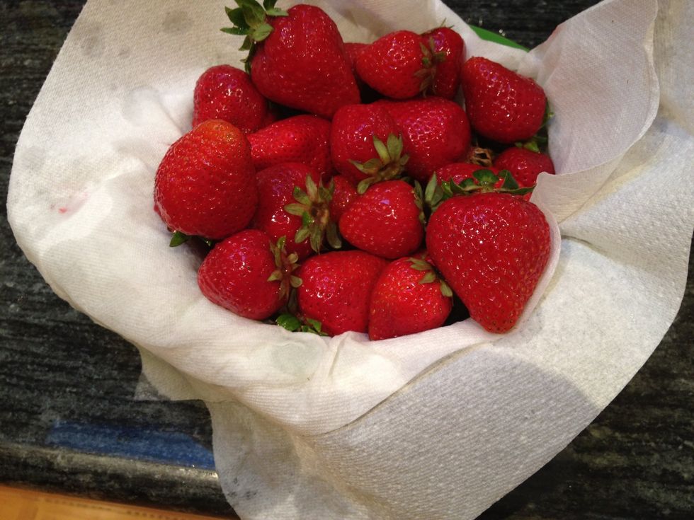 Give the berries a good rinse, and then gently pat dry. Make sure to remove as much moisture as possible.