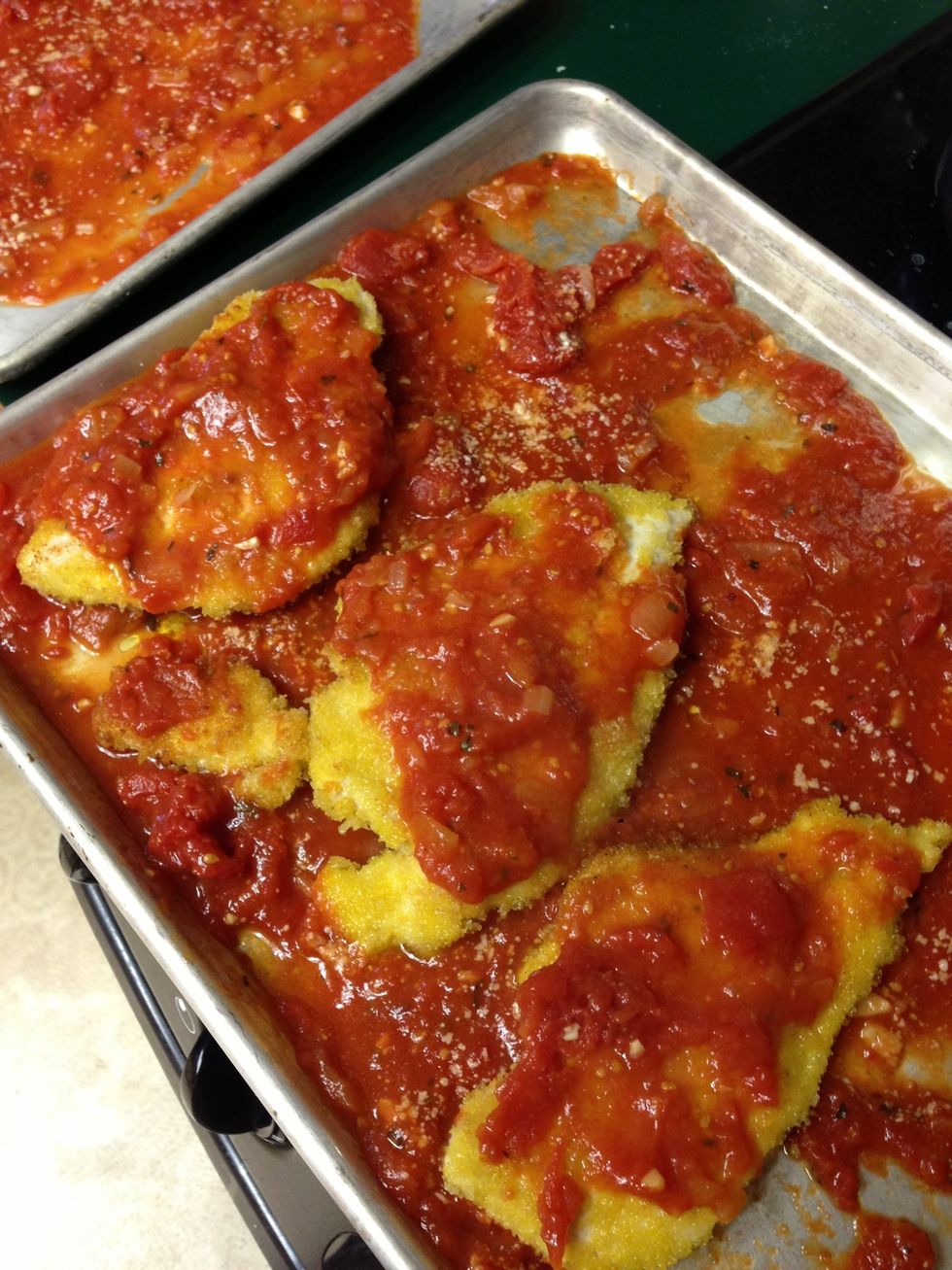 Give the chicken a thin coat of marinara on top