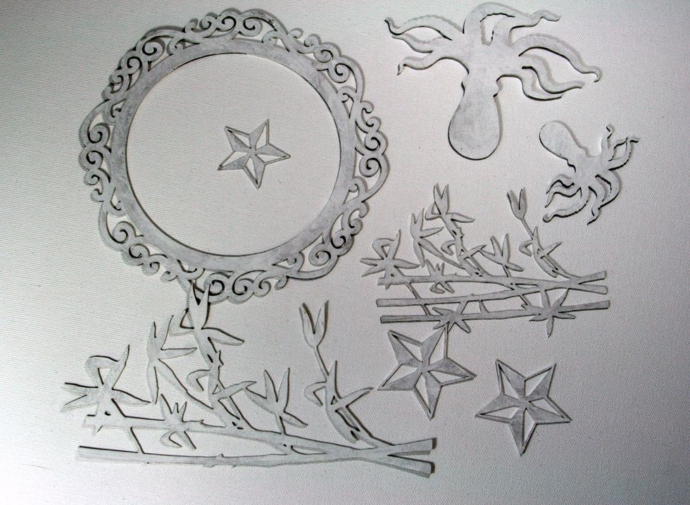 Give the chippies a base coat of Gesso and allow to dry.