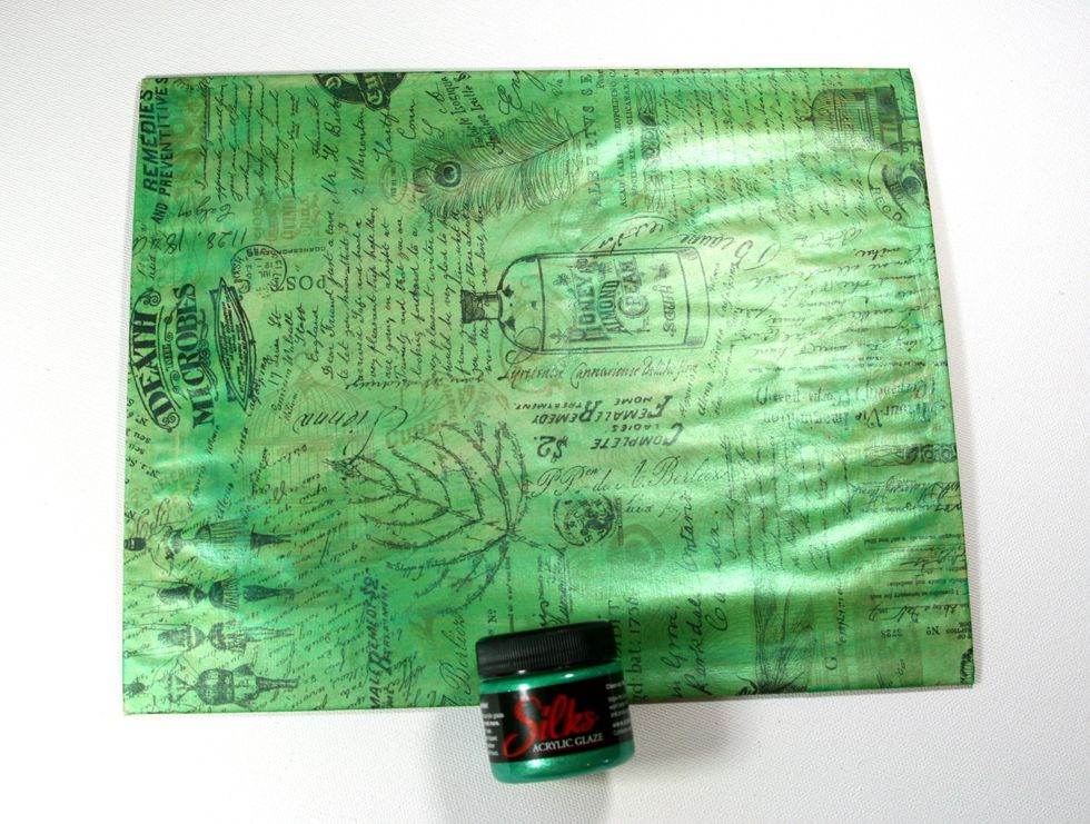 Give the covered chipboard panel a base coat of Midori Melon Silks Acrylic Glaze.