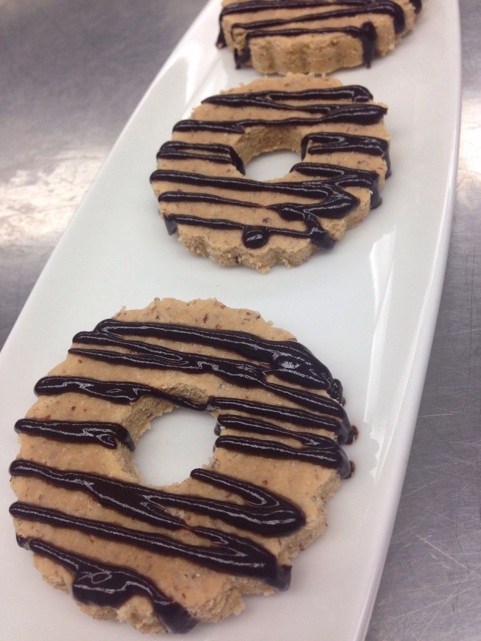 Glaze with vegan chocolate or sandwich with dehydrated jam.