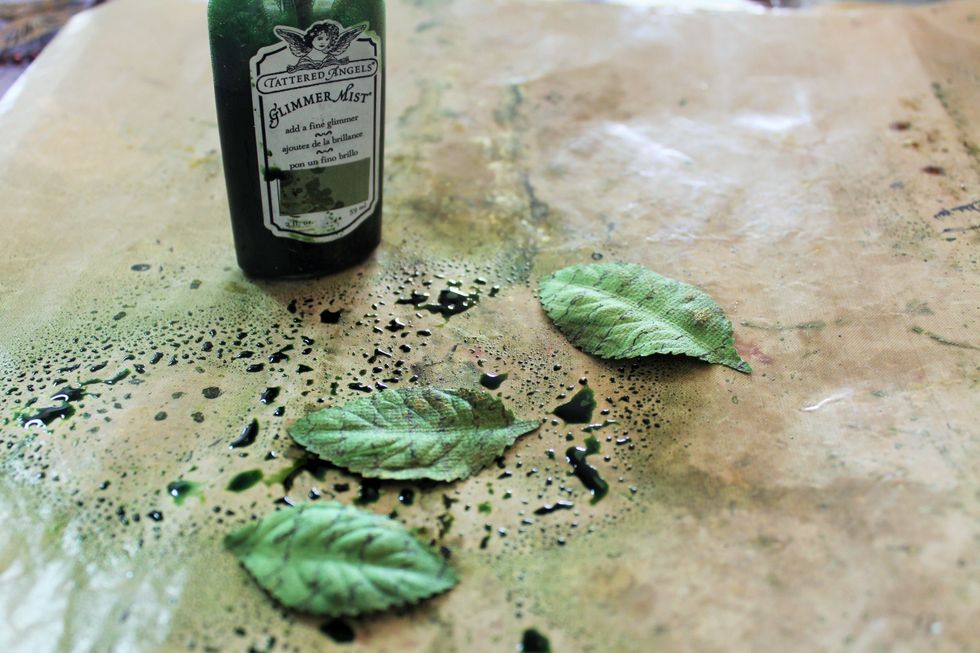 Glimmer mist the leaves that were included in the add on using a green Glimmer Mist of your choice.