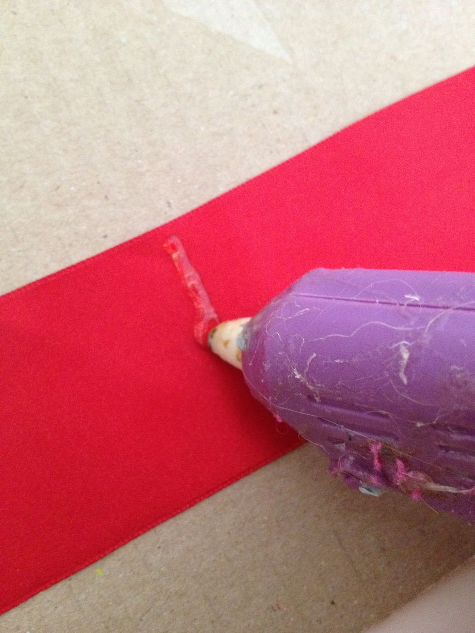 glue a line right down the middle with the glue gun