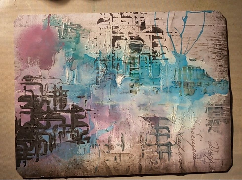 Glue a paper on it. I choose a one, which I recently used to trying my AA stencils and paints.