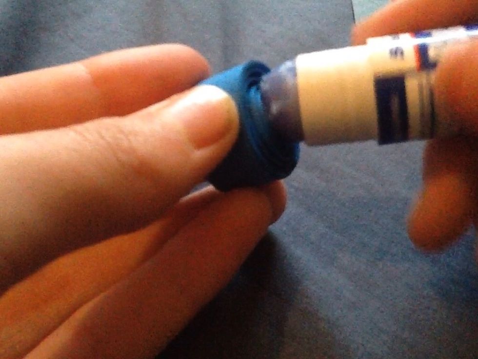 Glue all of the bottoms to the card and don't be afraid to really lay on the glue!