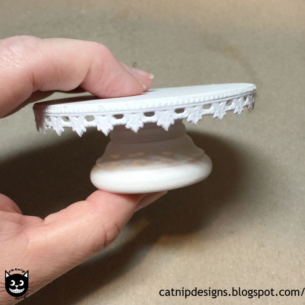 Glue along the edge of the 3" Round Wooden Base with white glue.