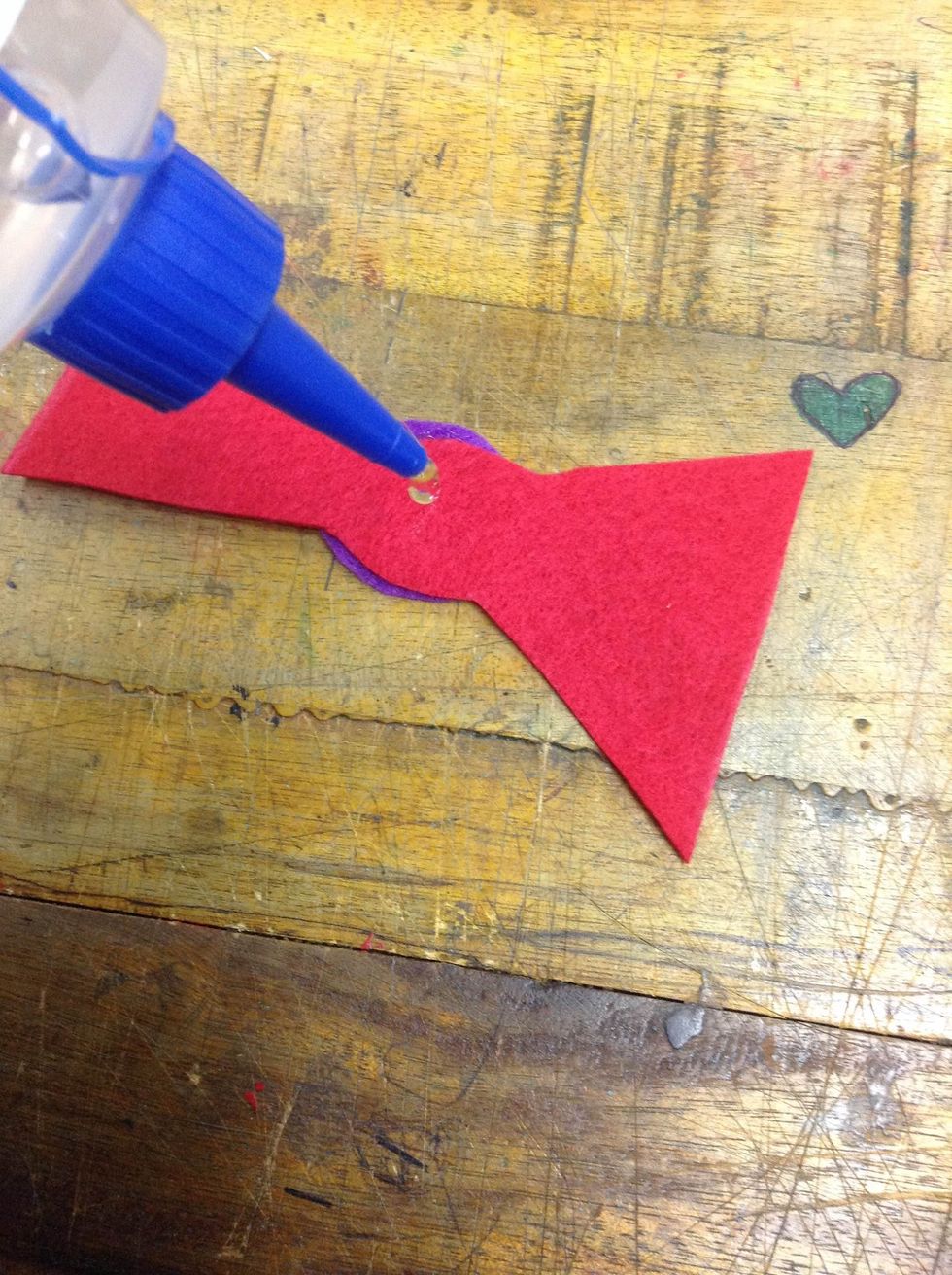 Glue any other accessories to the monster. You can use a hot glue gun or regular liquid glue.