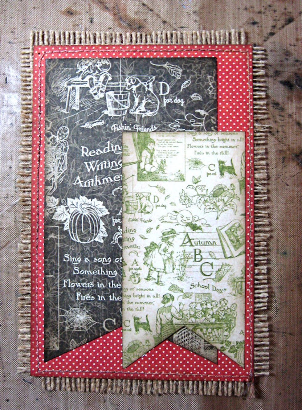 Glue banner pieces onto the red dot panel as seen here.