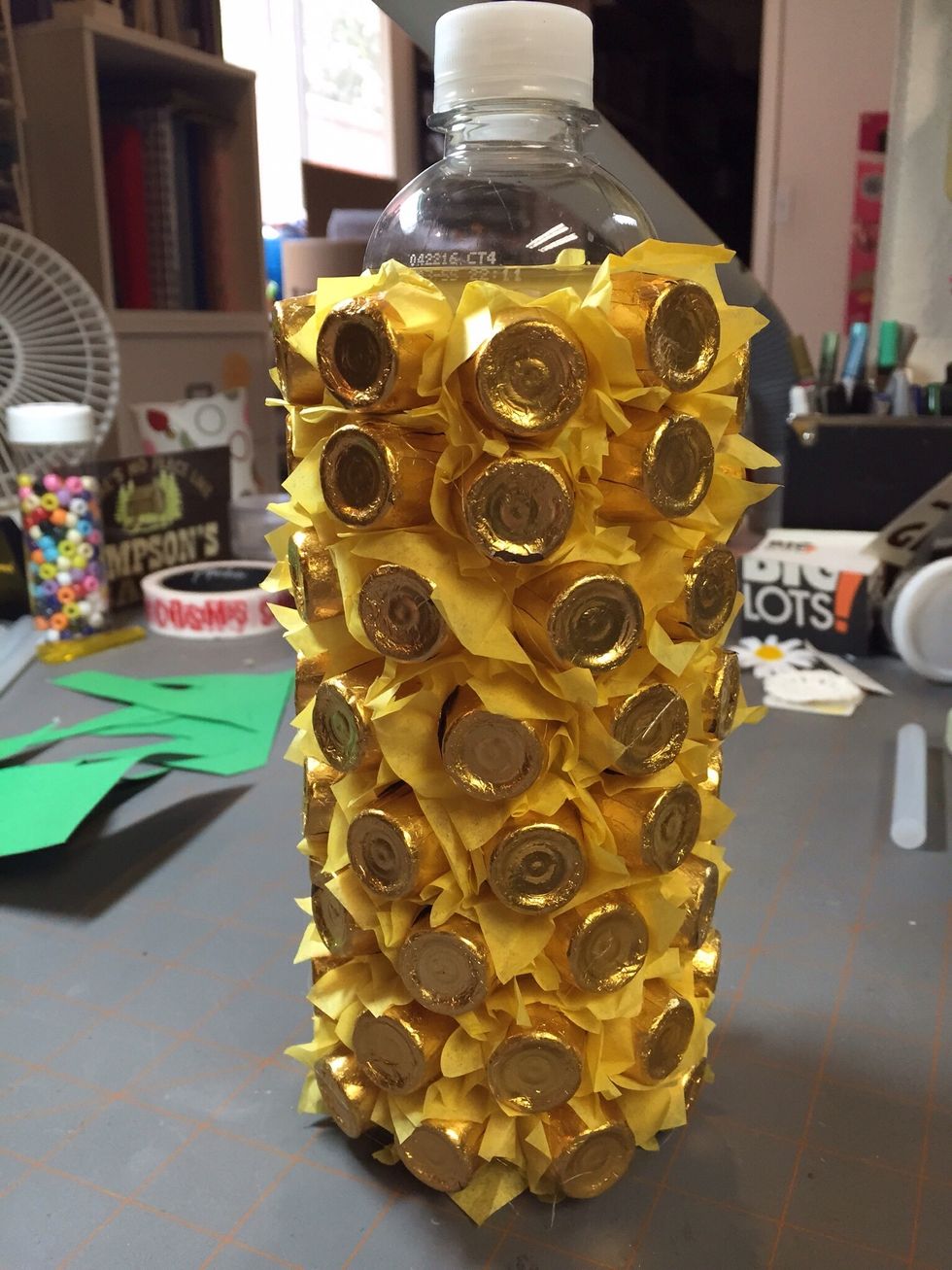 Glue candies up to the point where you want to add your stem.