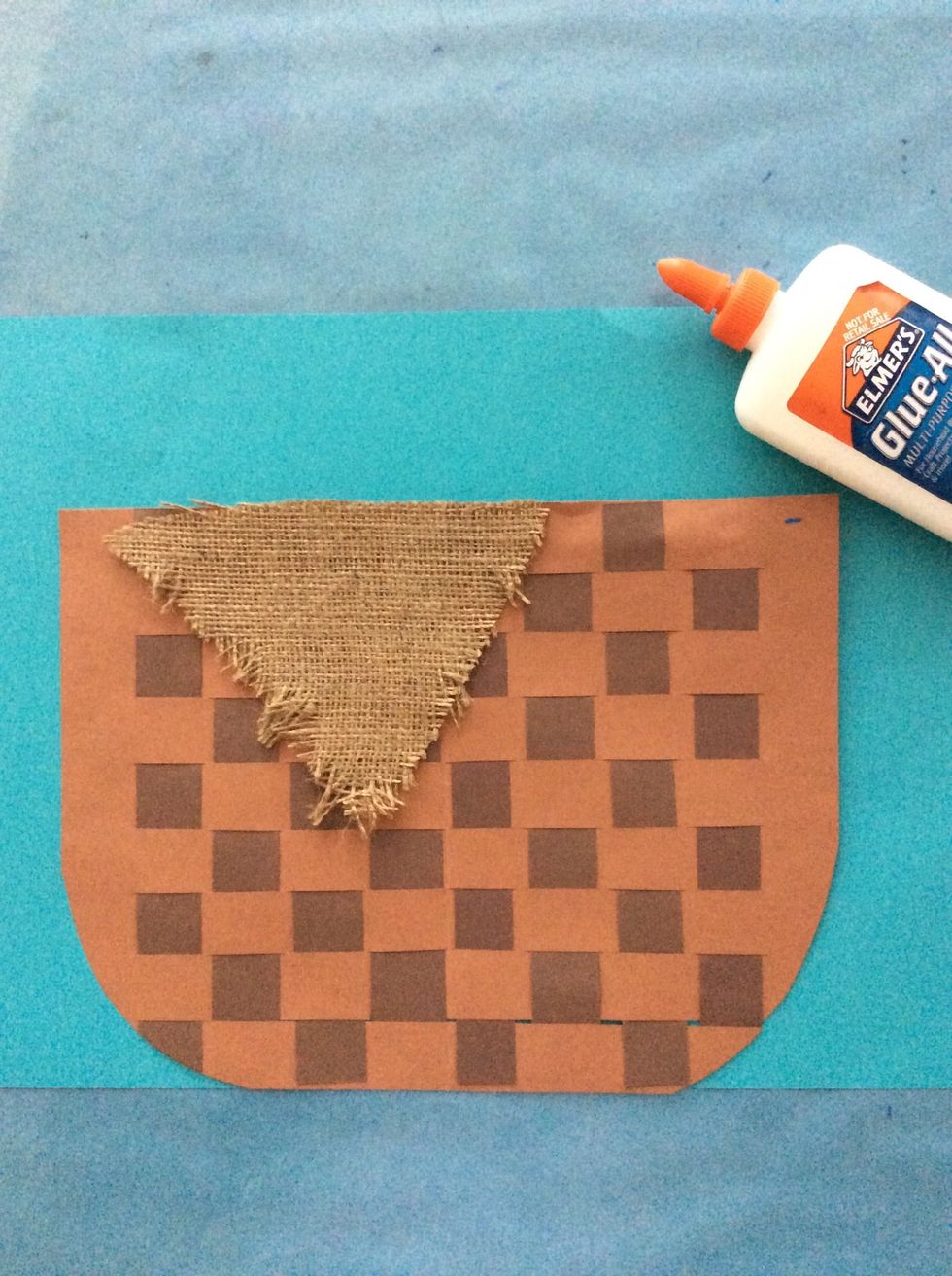 Glue down burlap at the top edge of your basket.