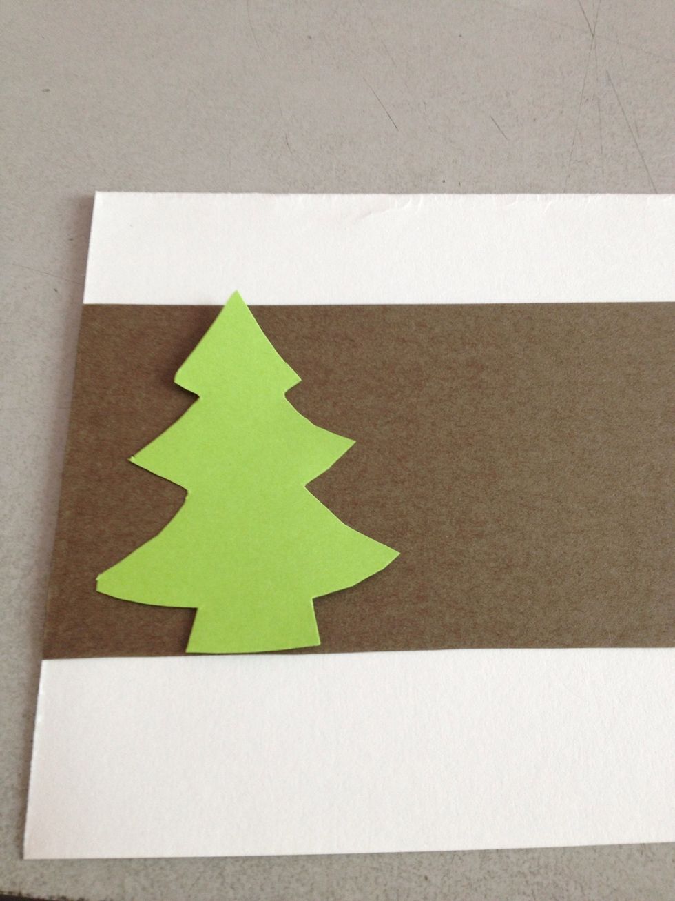 Glue down the Christmas tree.