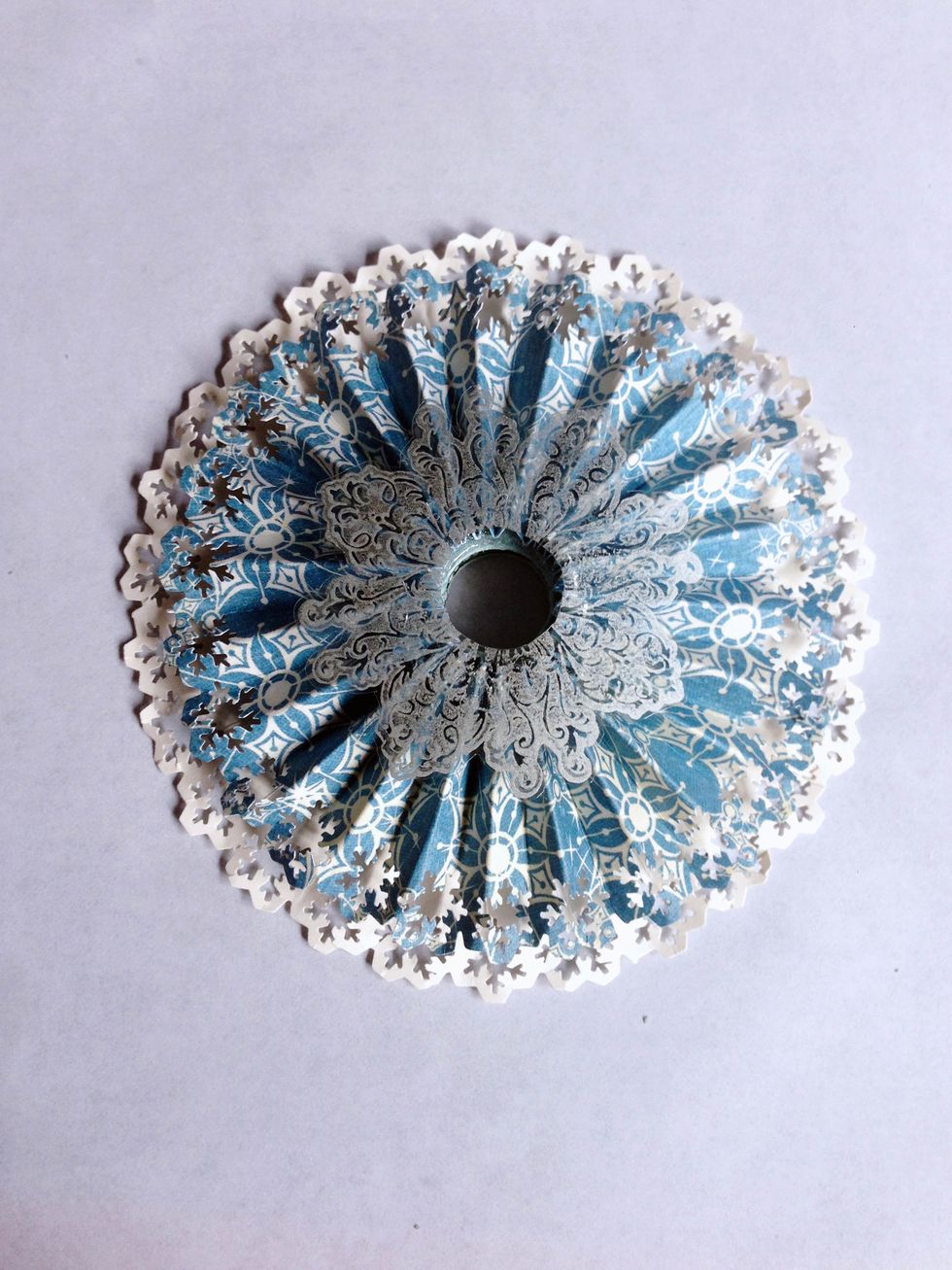 Glue down the snowflake you've done on Step 22 as shown... And you're done with the fairy's rosette skirt!!!