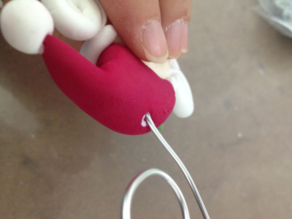 Glue into the hat.