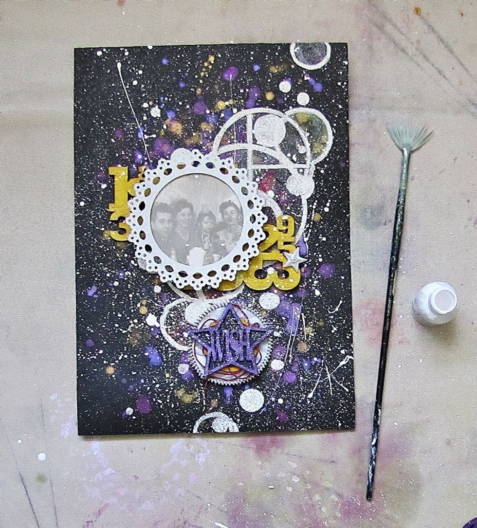 Glue it all together and add some more white splashes with watered gesso or splash ink.