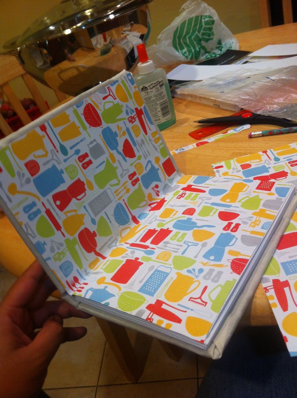 Glue it (I use a hot glue gun) I always start with the paper first. Do the same with the other side