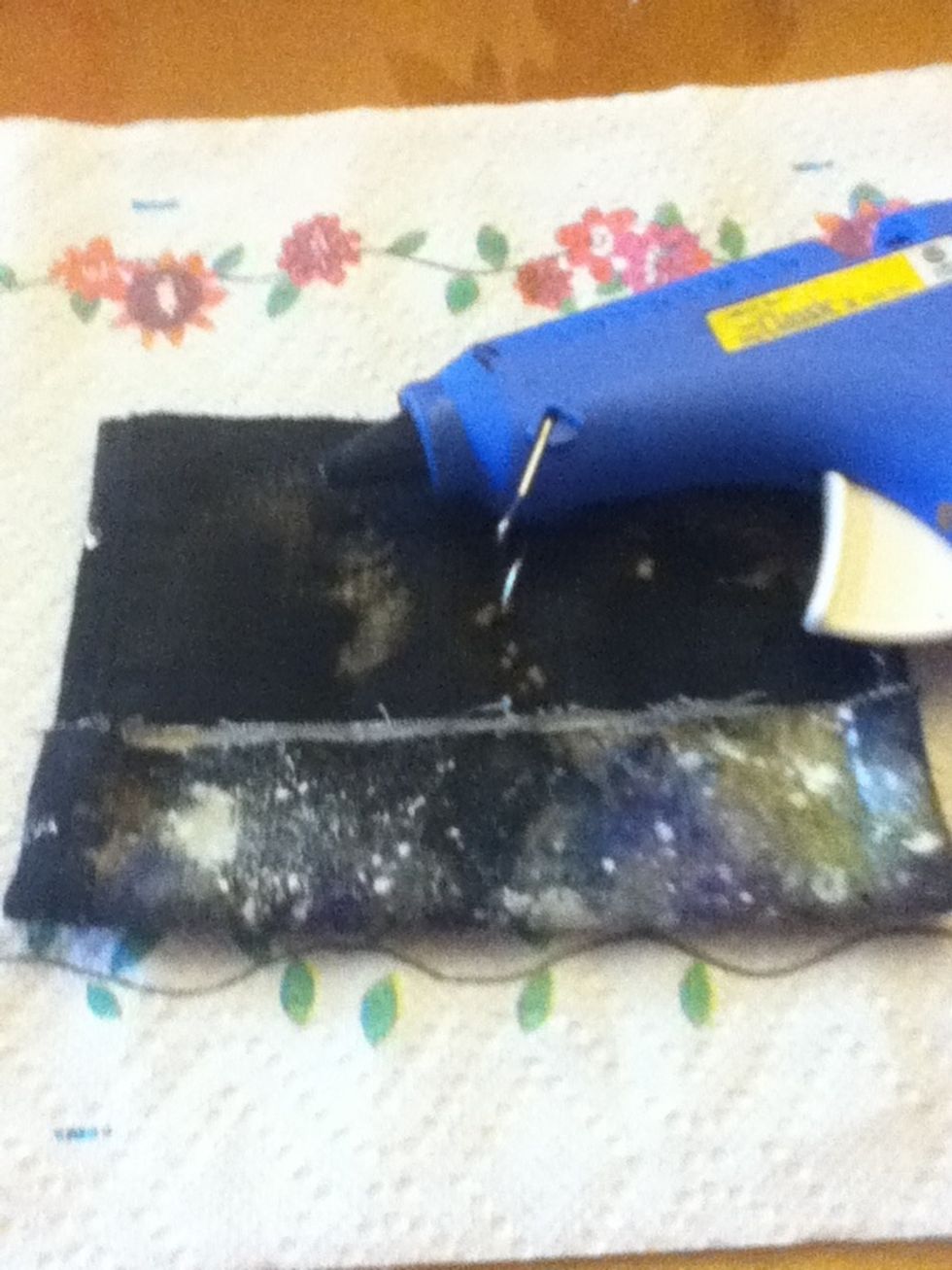 Glue it with a hot glue gun.