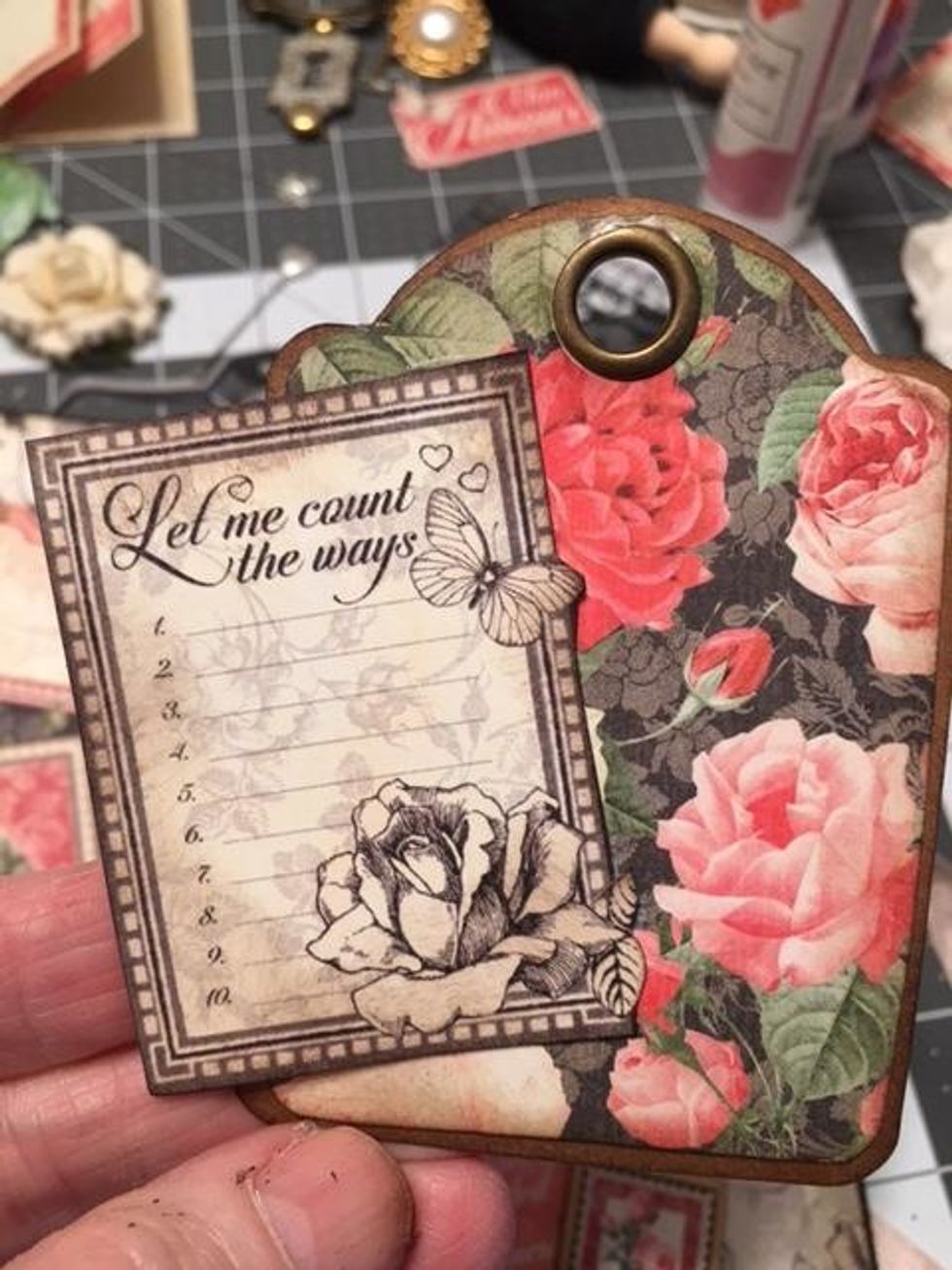 Glue "Let Me Count the Ways" cut a part to the left side of the tag, off centered.