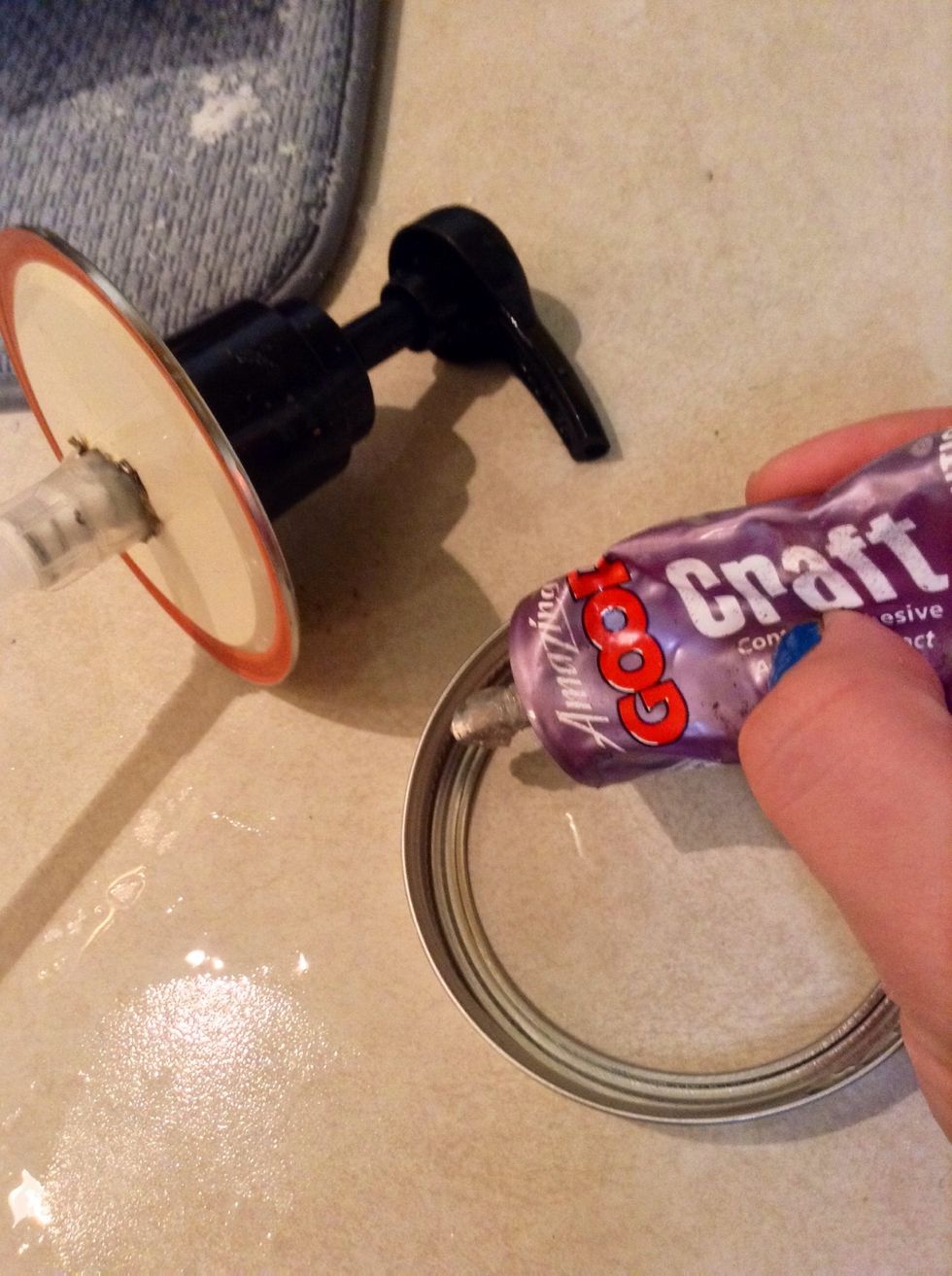 Glue lid on pump and lid ring. I use Goop Craft. It dries fast and is waterproof.