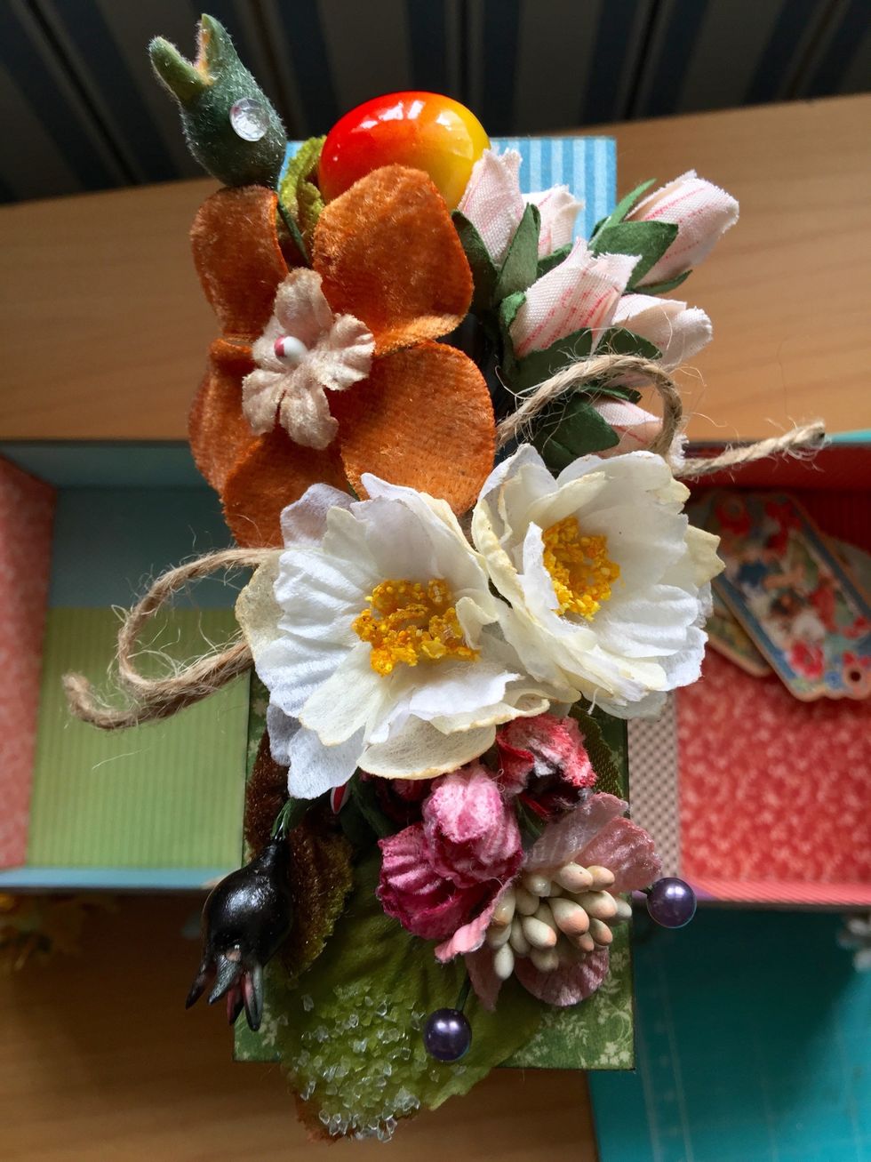 Glue more flowers on the top