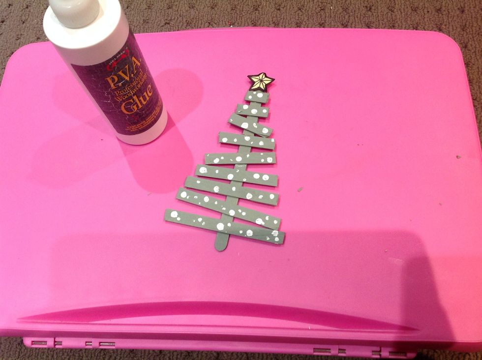 Glue on the branches to the backing. Tilt them for an effect, or keep them straight.