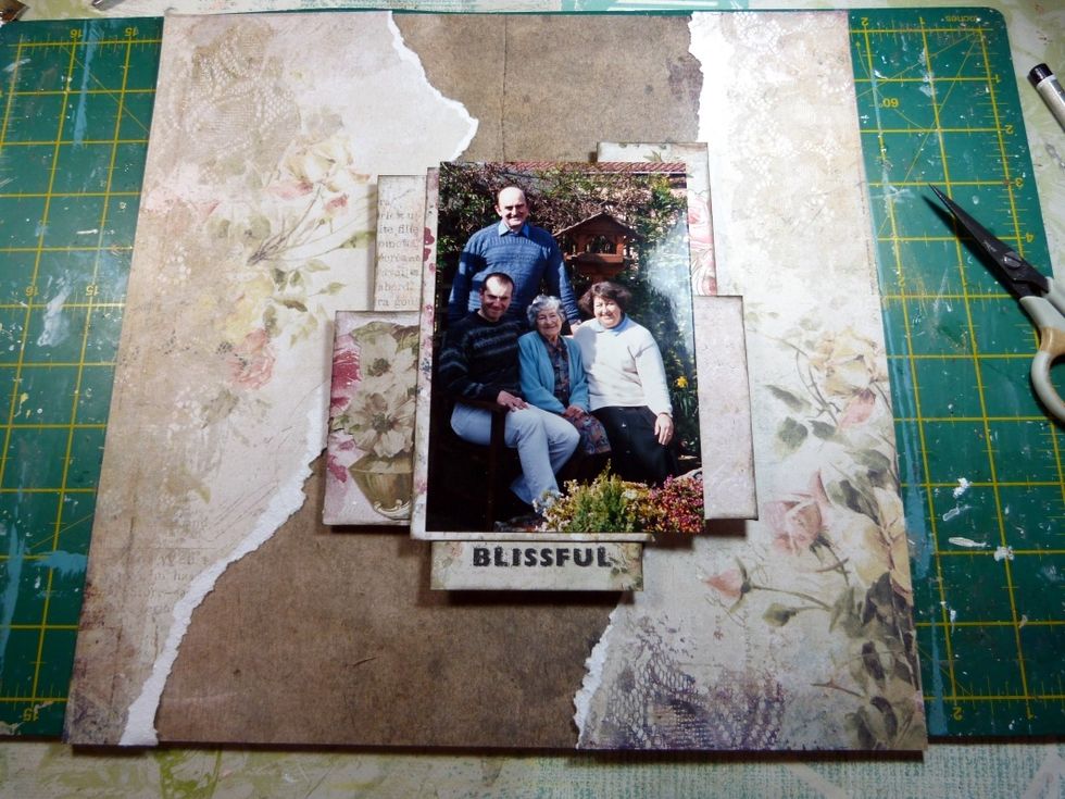 Glue on to layout. Add title, from the 'Calling cards' paper, also inked up edge.