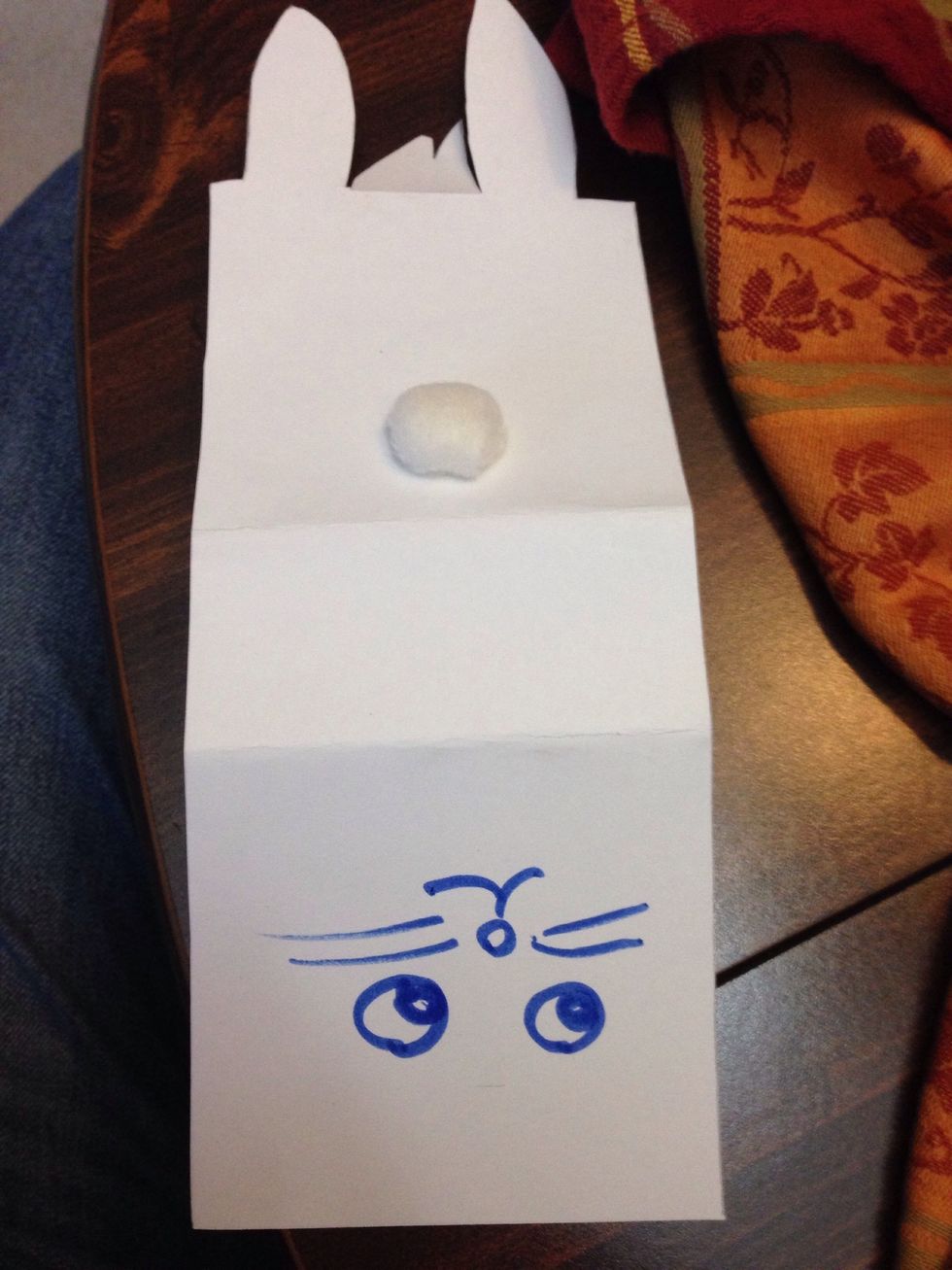 Glue on your cotton ball for your bunny's tail.