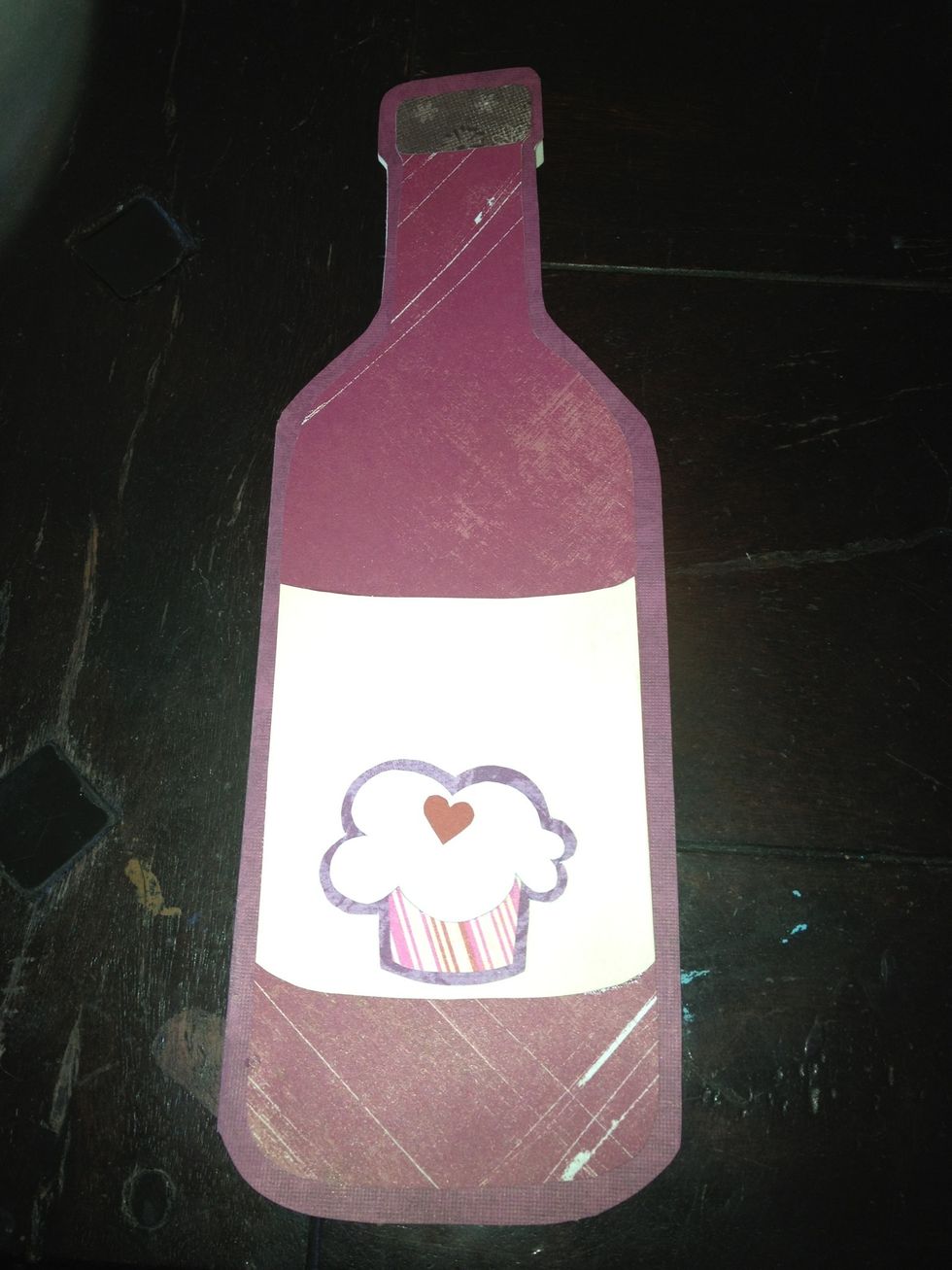 glue on your cupcake and cork, place back beneath yearbook to set.