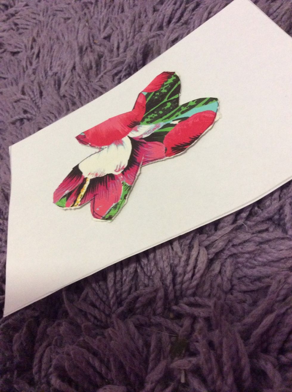 Glue on your silhouette. I've found that the scrap booking paper looks the best :)