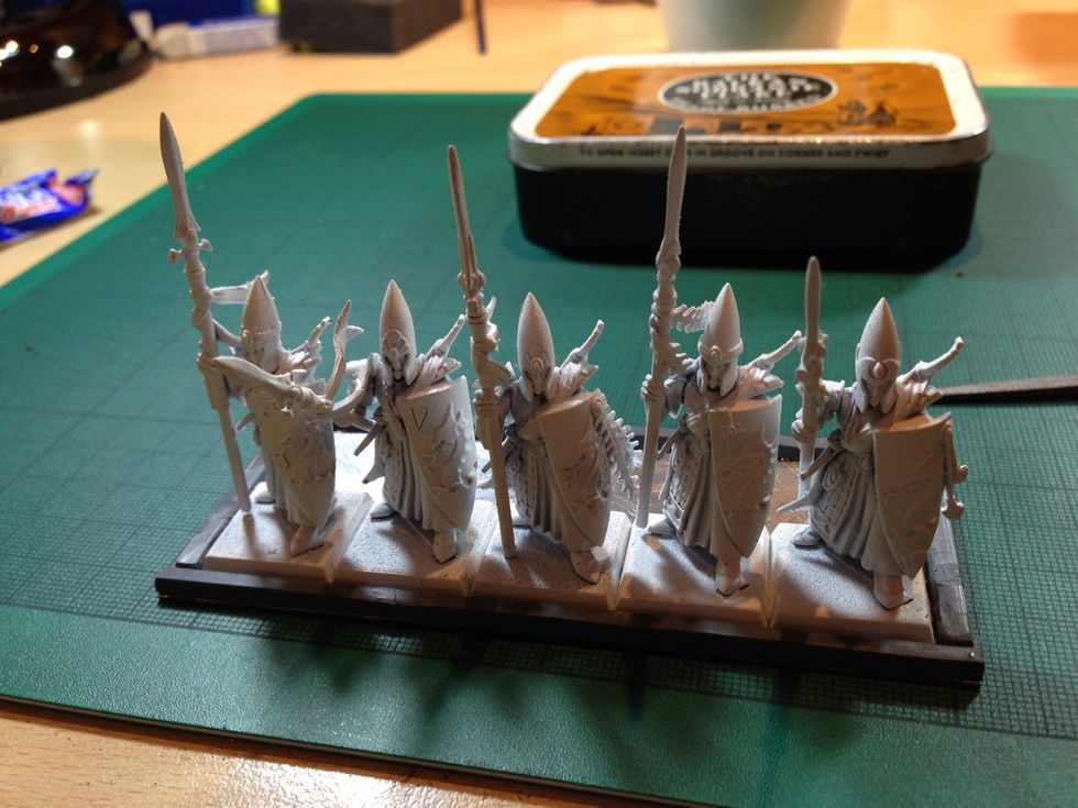 Glue on your sprue borders. Take the opportunity to make sure everything fits at this stage, or you are going to be swearing later.  File any excess sprue off at the corners.