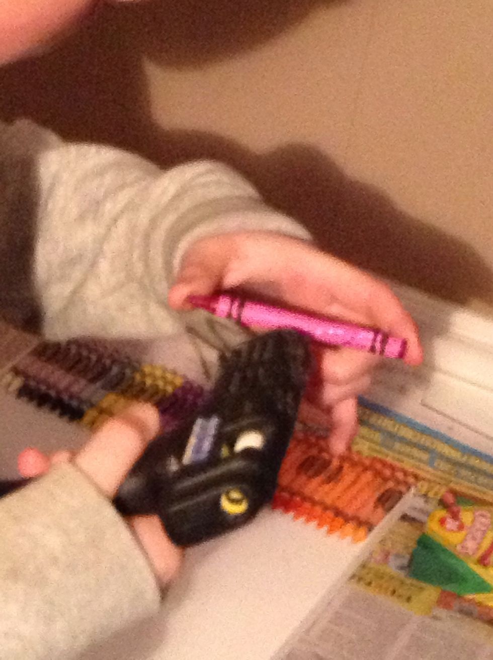 Glue one side of crayon; don't put to much or you will melt the crayon