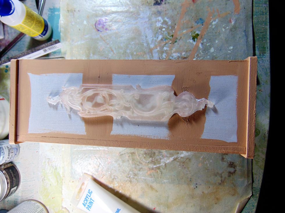 Glue one to each side of the hutch.